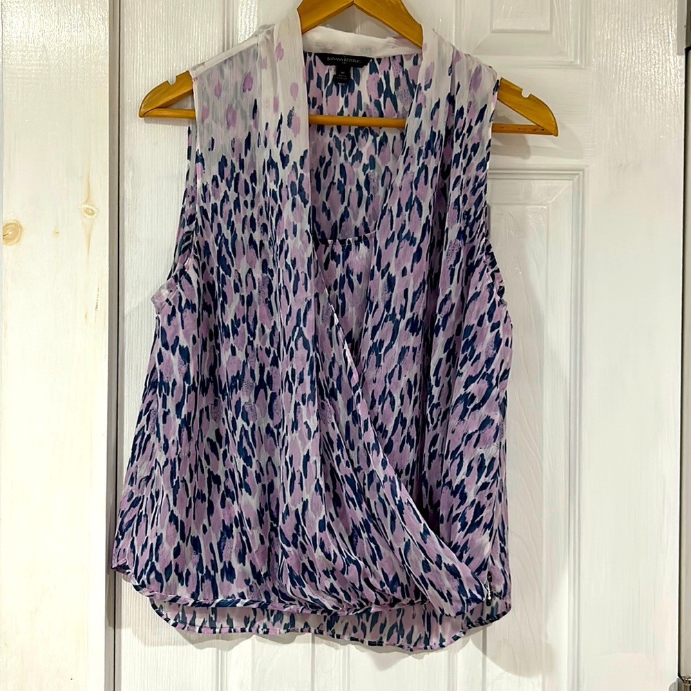 Drape front sleeveless top